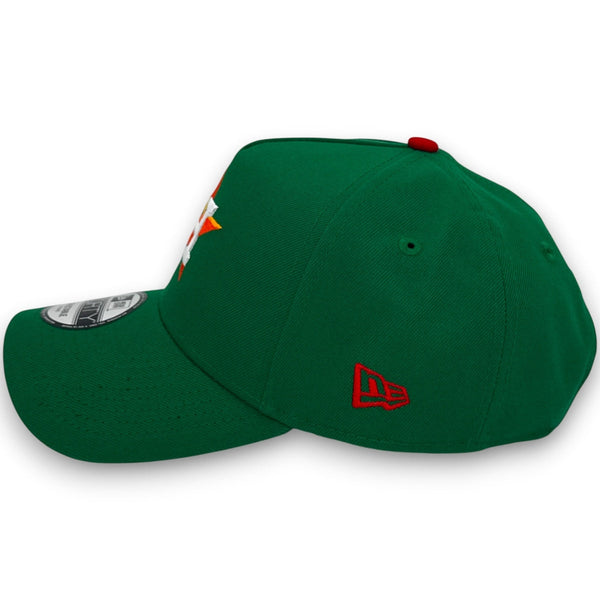 Green baseball cap with a red logo on a white background
