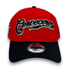 Red and black cap with 'Cerveceros' text on a white background