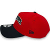 Red and black baseball cap with New Era logo on a white background