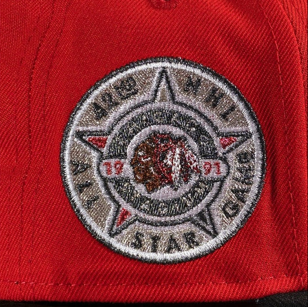 Close-up of a red cap with an embroidered logo featuring a star and text. 42nd ASG 59FIFTY Red New Era Hat