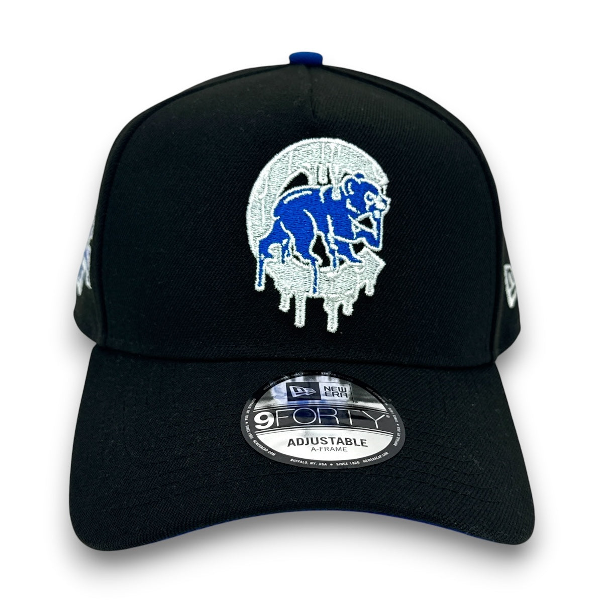 Black cap with a blue and white logo on a white background