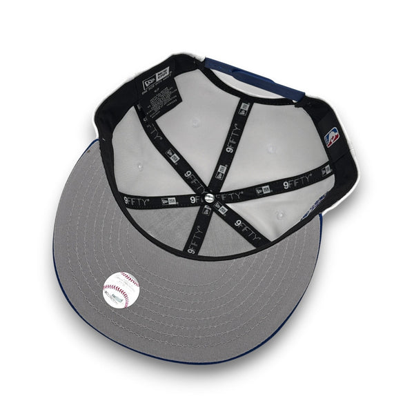 Gray baseball cap with black brim and '9FIFTY' logo on a white background