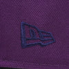 Close-up of a purple fabric with a brand logo embroidered on it.The Pirates Brooklyn 42 ASG 59FIFTY Grape New Era Hat The Pirates Brooklyn 42 ASG 59FIFTY Grape New Era Hat