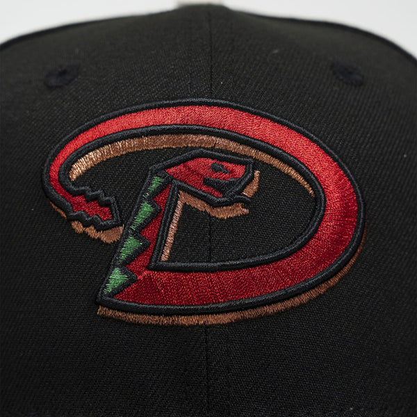 Black cap with a colorful logo on a white background- The Pirates Dbacks 98 59FIFTY Black New Era Hat