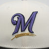 Baseball cap with a purple 'M' logo on a white background The Pirates Expos 02 ASG 59FIFTY Brick New Era Hat