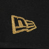Gold embroidered logo on a black background. Bradenton Marauders