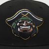 Black cap with a pirate-themed embroidered patch on a white background -Bradenton Marauders