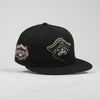 Black cap with embroidered designs on a light gray background- Bradenton Marauders