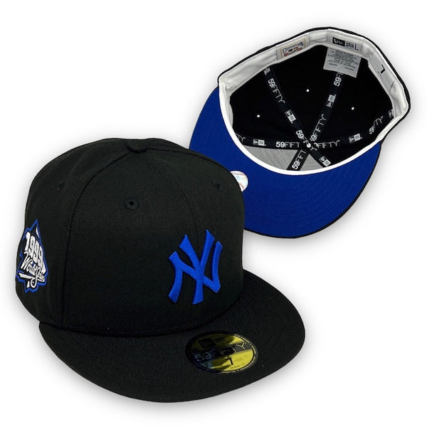Yankees 99 WS New Era 59FIFTY Black Fitted Hat Royal Blue Bottom