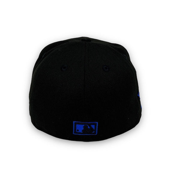 Yankees 99 WS New Era 59FIFTY Black Fitted Hat Royal Blue Bottom